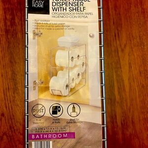 Toilet tissue dispenser, with shelf.